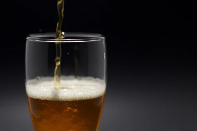 Cobra vs Kingfisher comparison with a lager being poured into a glass