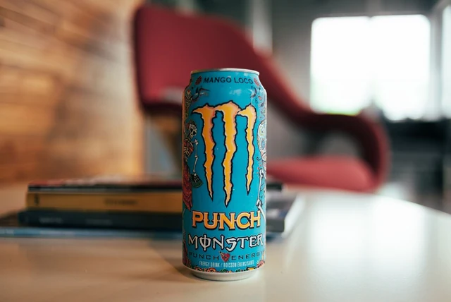 Monster Energy caffeine content shown on a 500ml can on a table